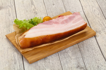 Smoked pork breast with salad leaves