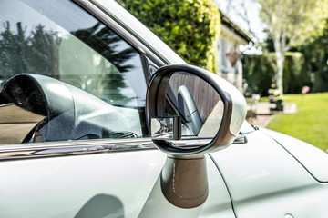 Detailed exterior view of a new, Italian-made super mini showing the drivers' side mirror. Part of...