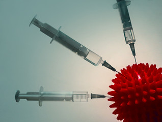 Syringe and red Coronavirus symbol. Injection of a cure for the virus COVID-19. Medical concept of...