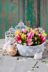 Fototapeta na wymiar Beautiful floral arrangement with tulip and carnation flowers