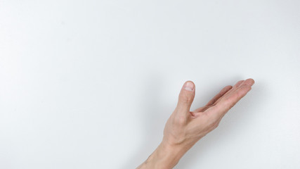 Open man hand on white background. Close up.