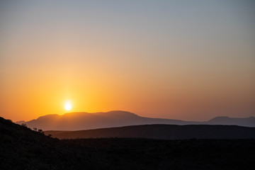 Naklejka na ściany i meble Aburma's desert at sunset