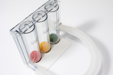Doctor's tri-ball incentive spirometry in hospital. The Tri-ball incentive spirometry is medical equipment for elderly or patient with post operation. Lungs function testing & Pulmonary test concept.
