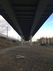 Slowly walking under the bridge