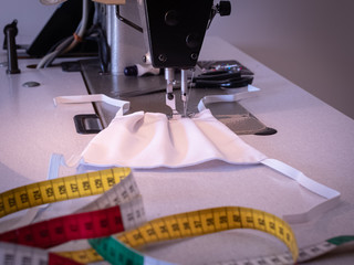 Fabrication de masques lavables pour la protection du visage contre virus, grippe, covid-19, allergie, épidémie et pandémie mondiale.	