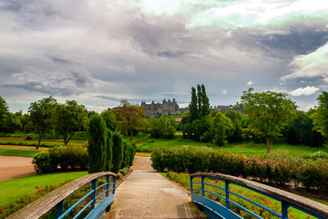 Fototapeta premium View of a medieval citadel from a distant footbridge