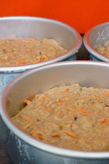 Raw batter for a vegan carrot cake in a cake mold