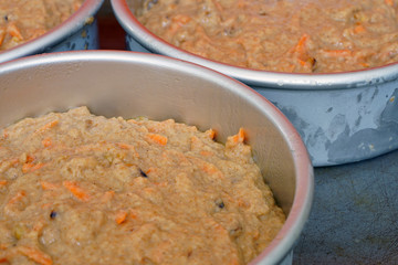 Raw batter for a vegan carrot cake in a cake mold