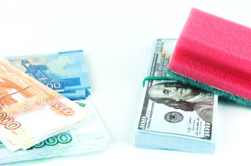 dish washing sponges on money, a concept of money laundering