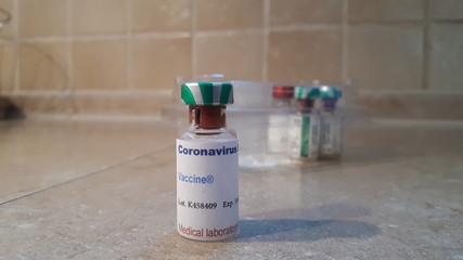 Ampule with coronavirus SARS-CoV-2 vaccine
