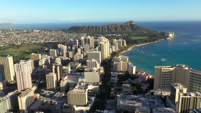 Aerial footage over city near the ocean Waikiki, Honolulu