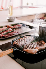 Cooking steaks in natural light