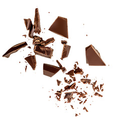 Flying Dark chocolate pieces isolated on white background.  Chocolate bar chunks, shavings and...