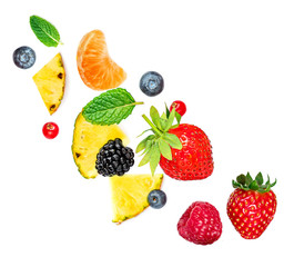 Creative layout made of summer fruits and mixed berries isolated on white background. Flat lay. Food concept..