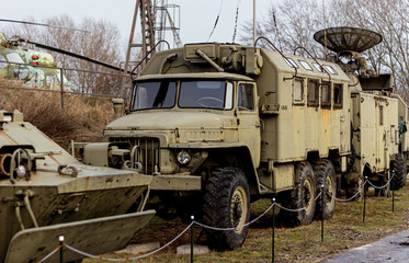 rusty Russian military vehicle in a museum outdoors