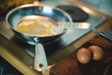 Heating butter and oil in a pan before cooking breakfast