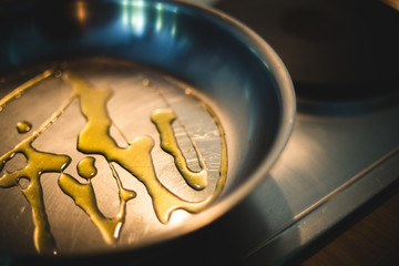 Section of a pan with olive oil in it
