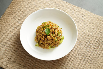 Stir Fried Pork with Yellow Curry Paste with studio light delicious looking