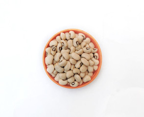 Black eyed beans in white isolated background. It is a subspecies of the cowpea, grown around the world for its medium-sized, edible bean. Scientific name - Vigna unguiculata