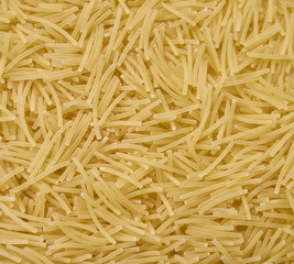 Close up photo of raw durum wheat pasta, filini vermicelles