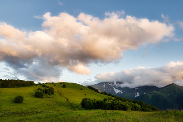 Obraz premium Mountain valley during bright sunrise. Beautiful natural landscape. Adygea