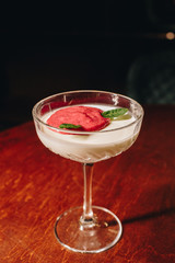 Stock Photo - Dessert panna cotta with fresh berries on a dark background
