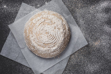 Fototapeta na wymiar Proofing dough in a special basket. Raise the dough before baking. Yeast-free dough. The fermentation process of the dough.
