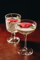 Stock Photo - Dessert panna cotta with fresh berries on a dark background
