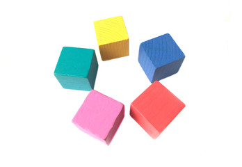 Fototapeta premium colored toy cubes in a circle on isolate
