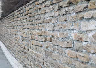 gray masonry wall in perspective background