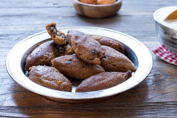 oruk, kibbeh plate over wooden table