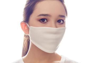 Asian woman wearing face protective mask.