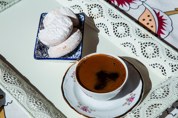 A cup of Turkish coffee, traditionally using for fortune telling. traditional porcelain turkish coffee cup