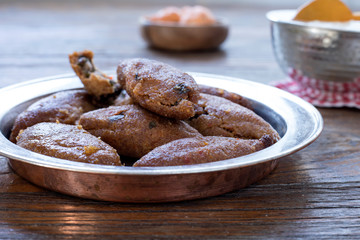 oruk, kibbeh plate over wooden table