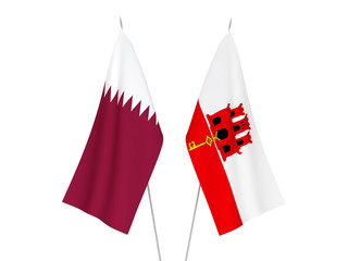 Gibraltar and Qatar flags