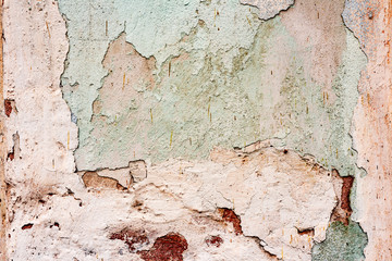 Texture of a concrete wall with cracks and scratches which can be used as a background