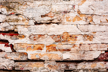 Texture, brick, wall, it can be used as a background. Brick texture with scratches and cracks