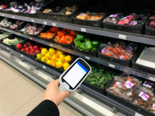 smart remote control grocery shopping the self check-out are on display at a supermarket