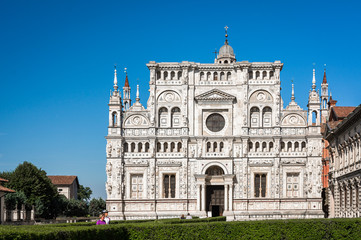 Fototapeta na wymiar Abbey church, Certosa di Pavia monastery, Lombardy, Italy. View of the Facade. Pavia, northern Italy, june 28, 2015