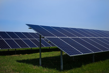 Large solar panels on sky background
