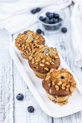Blueberry Muffins (selective focus; detailed close-up shot)