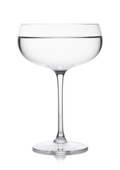 Vodka martini gin cocktail in luxury crystal glass on white background with reflection.