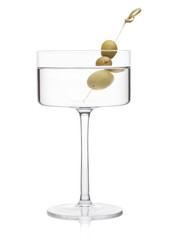 Vodka martini gin cocktail in modern glass with olives on bamboo stick on white background with reflection.