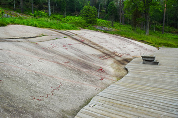Rock Carvings from Bronze Age, which are about 3000 years old, located at one time on the shores of...