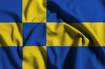 Flag of Tilburg, the Netherlands, with waving fabric texture	