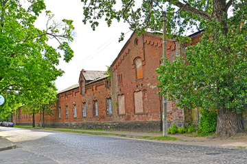 Old brick building of German construction on Pervomayskaya Street. Sovetsk, Kaliningrad region