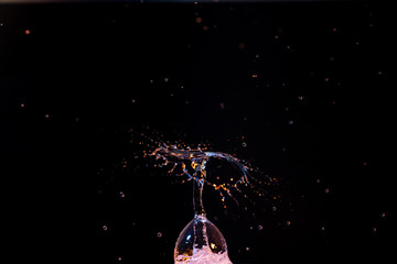 Fototapeta na wymiar High speed macro photography of a water drop splashing