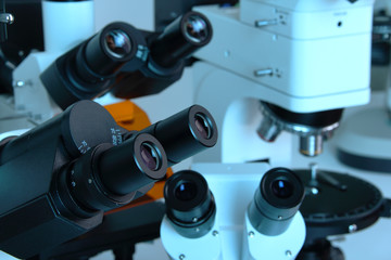 Fototapeta na wymiar Group of Microscopes