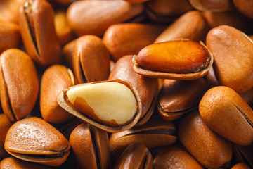 Pine nuts on a white board