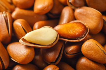 Pine nuts on a white board
